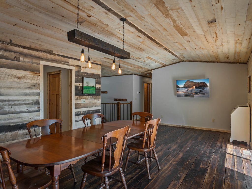 Dining & Upper Level Family Room ( we have added 2 recliners in front of TV)