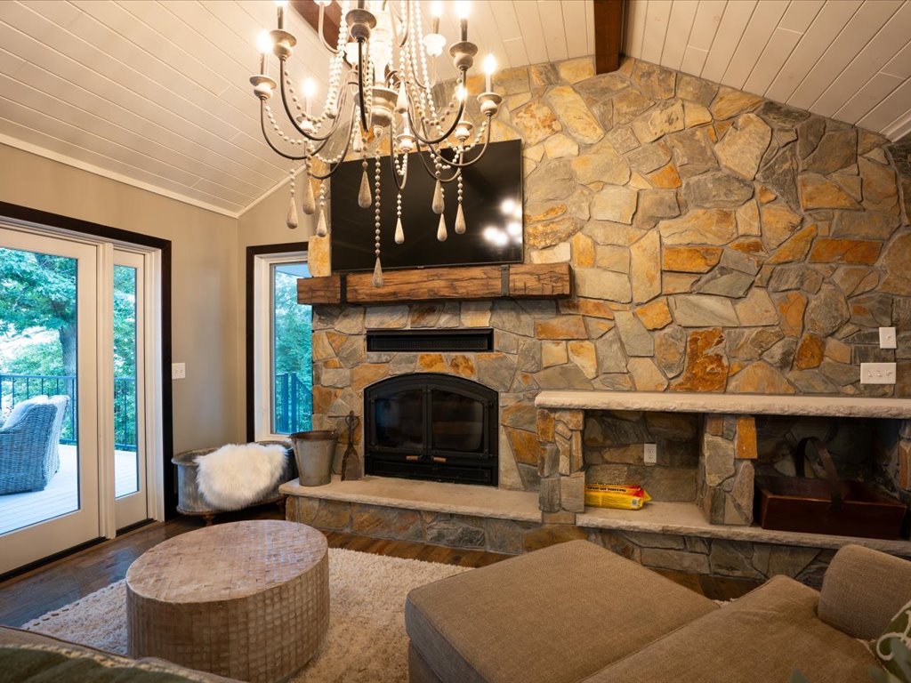 Living room with wood burning fireplace