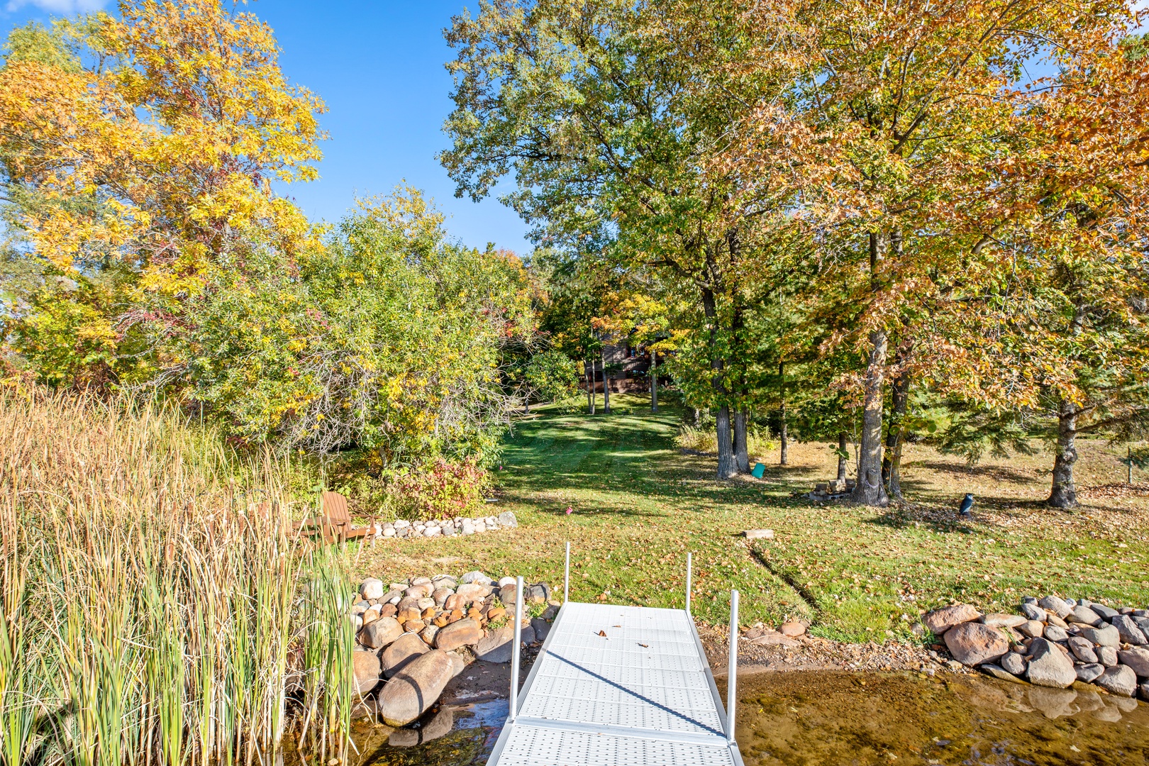 dock + sandy lake bottom