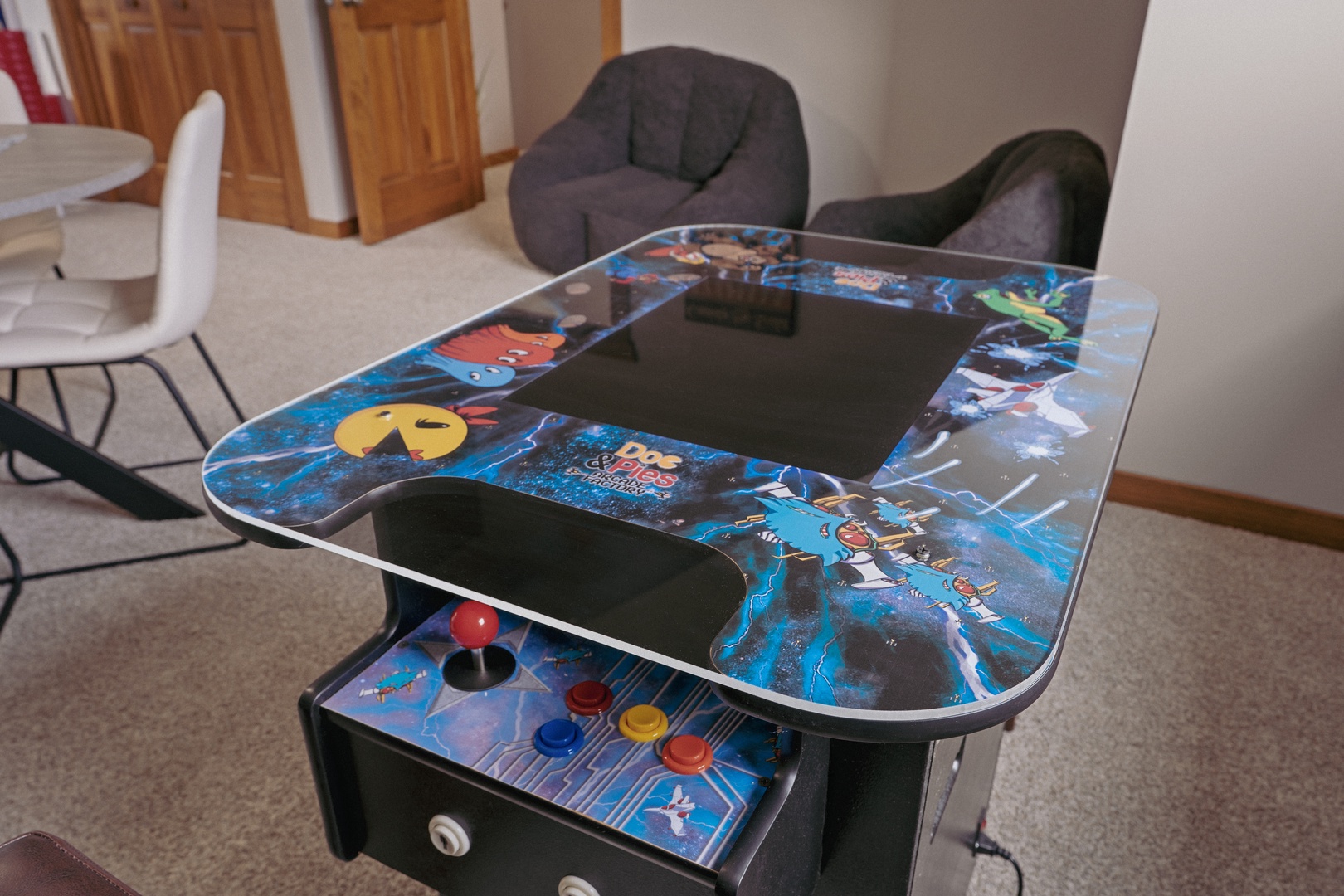 Pac Man machine in game room.