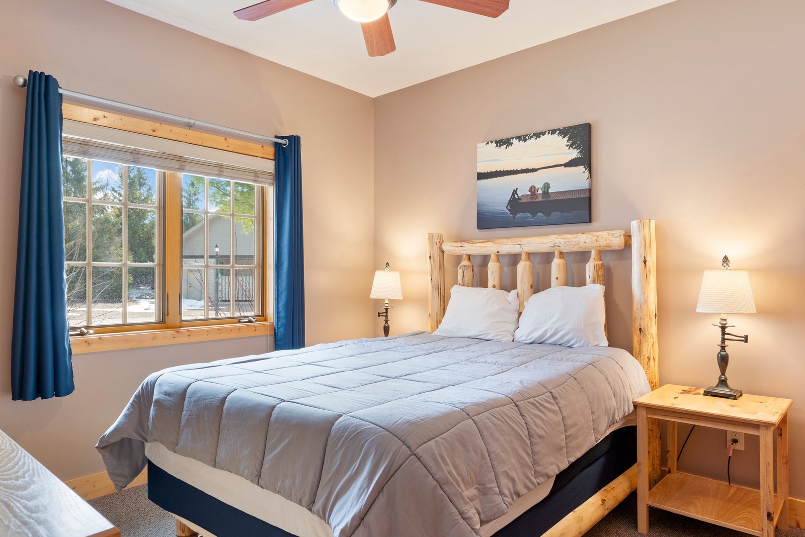 Main Floor Bedroom (Queen) with Attached Bathroom