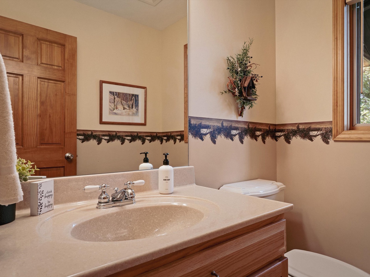 Main level half bathroom.
