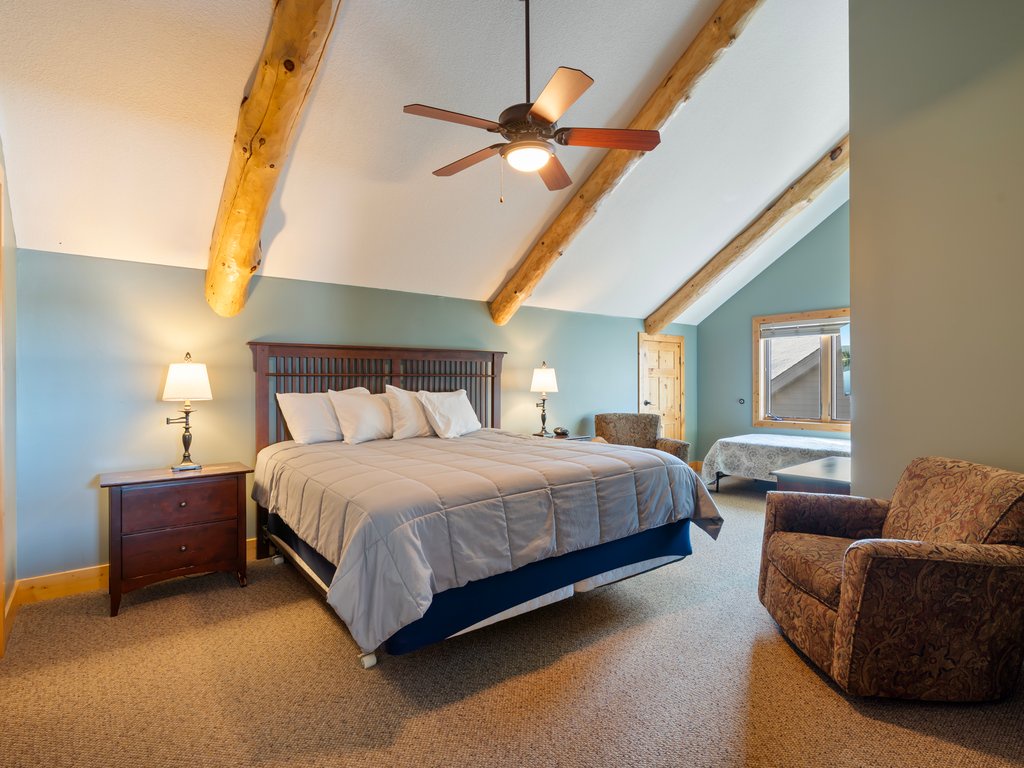 Drift to sleep under rustic beams in your peaceful retreat
