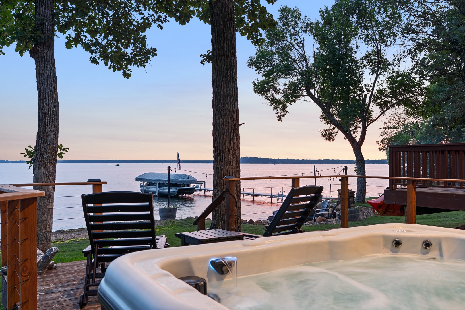 Private hot tub with lake views.