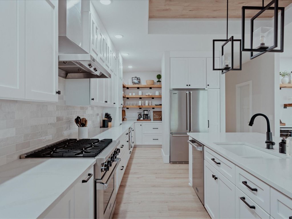 View into the butlers kitchen with additional Refrigerator