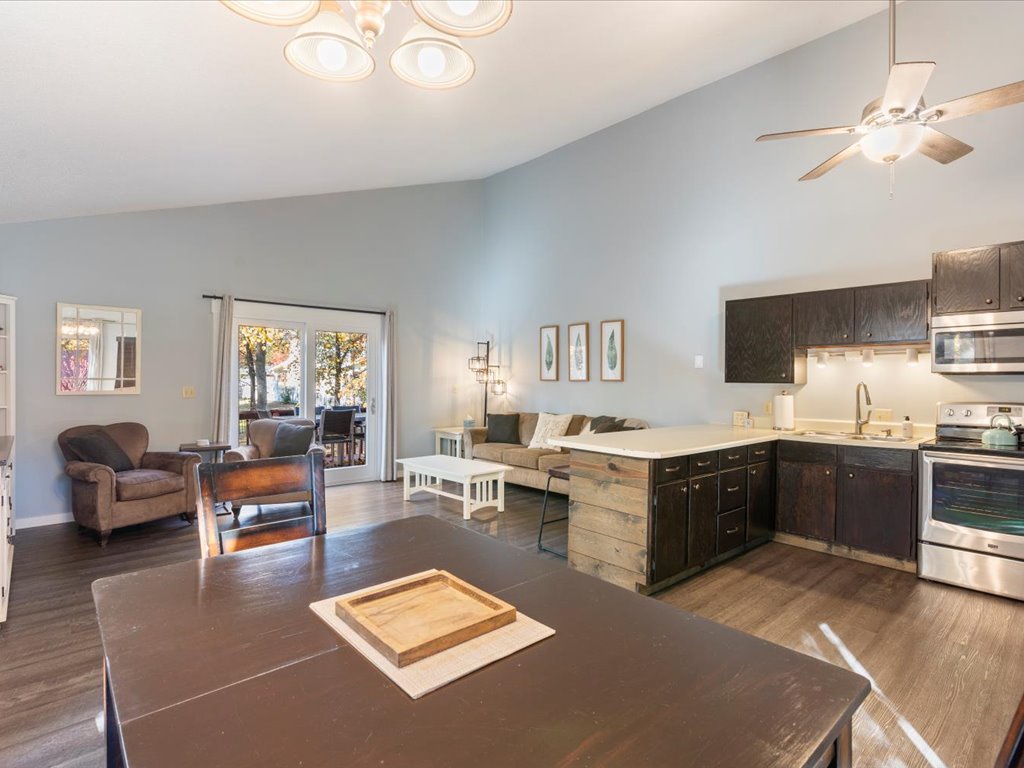 Open layout looking into the kitchen, living and dining room