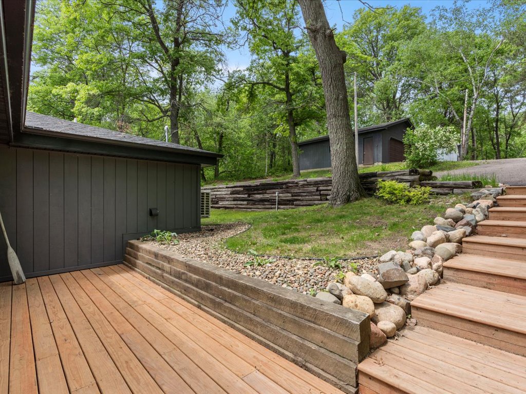 Property has towering trees, offering a peaceful outdoor spaces