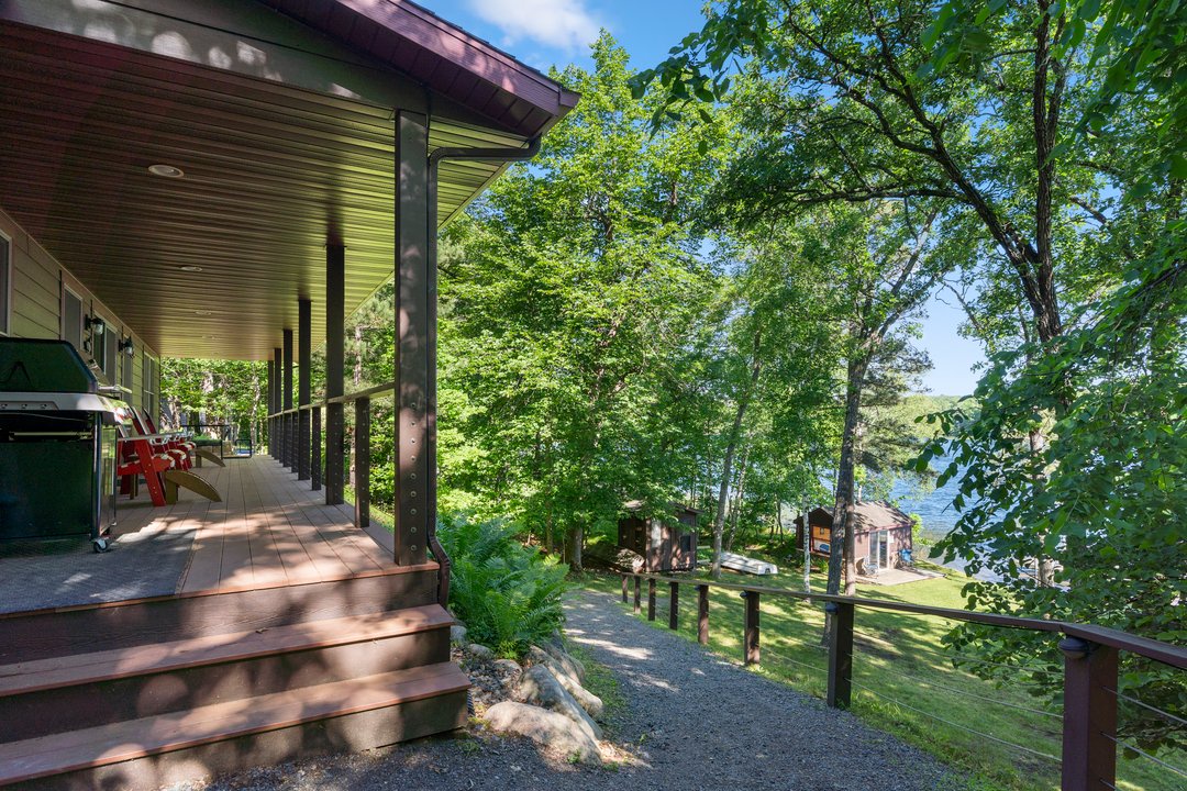 Gradual Hill leading to the boathouse, lake and firepit.