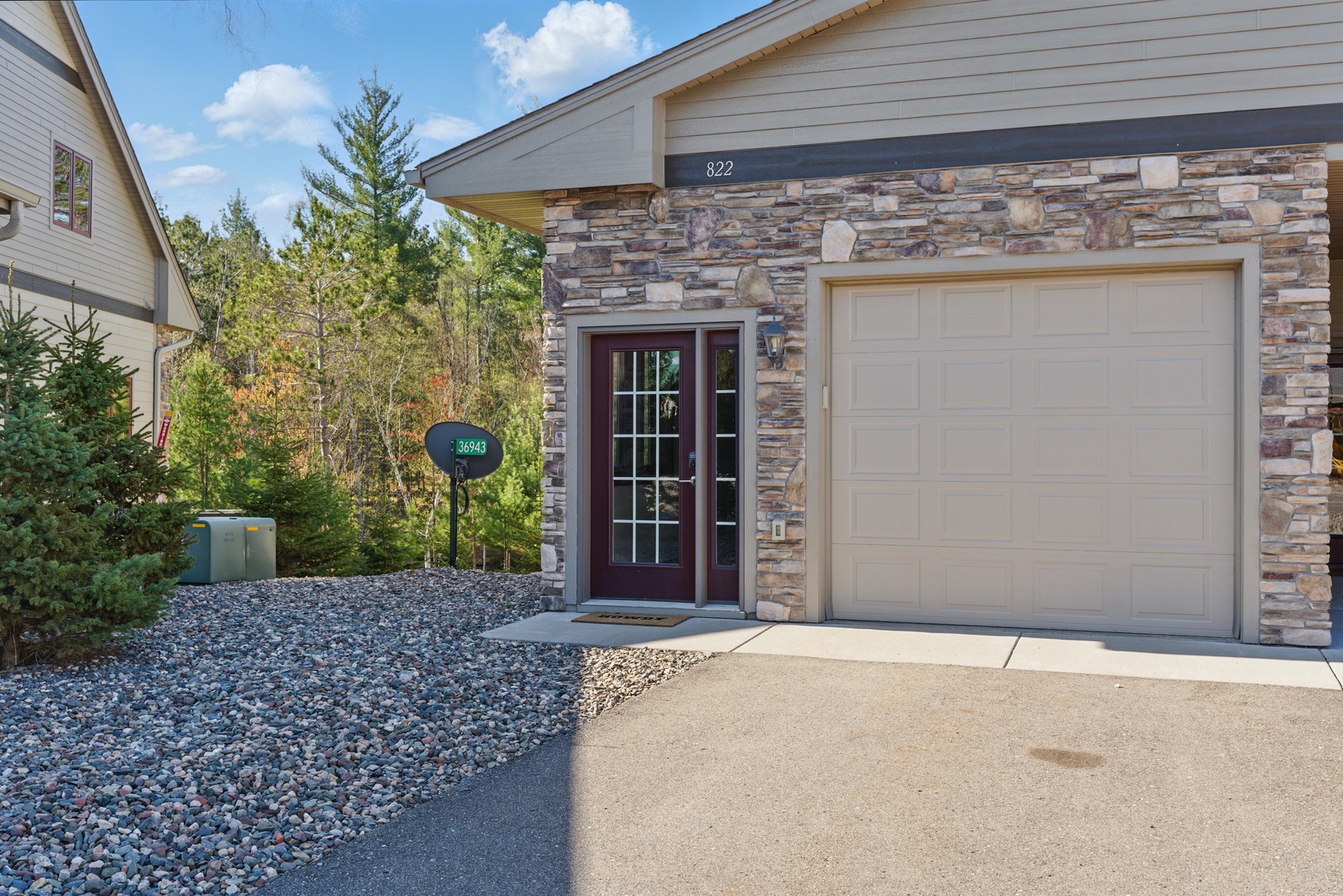 Front Door, parking for 2 cars.  Downstairs to access unit