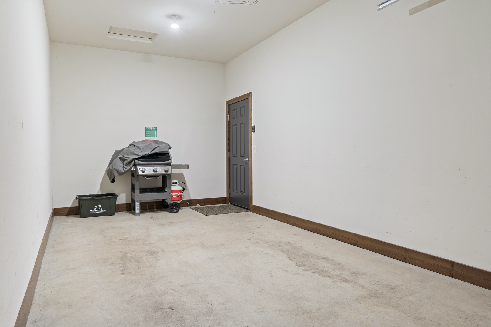 Garage for parking one vehicle and Grill