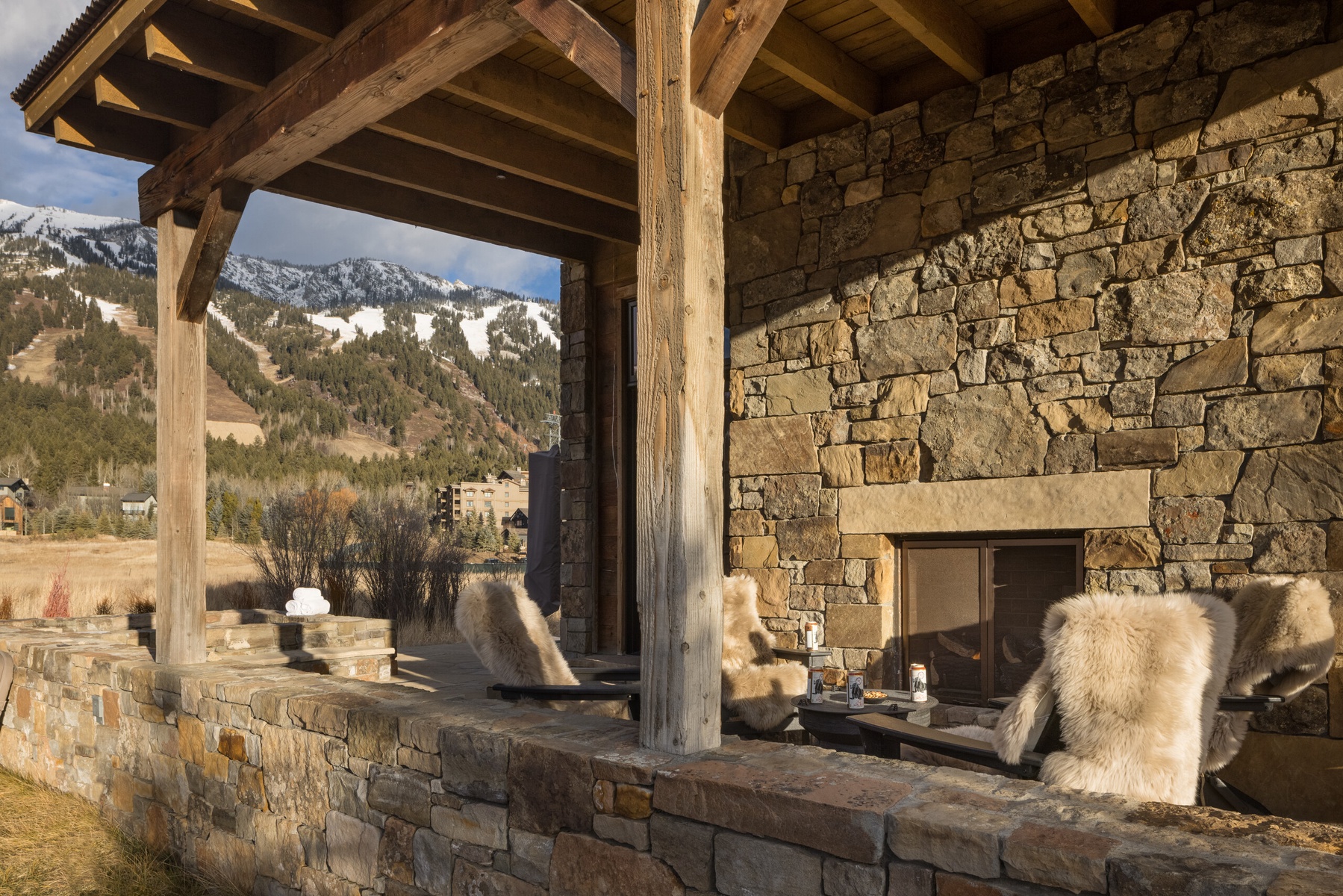 08-first-tracks-covered-patio-fireplace