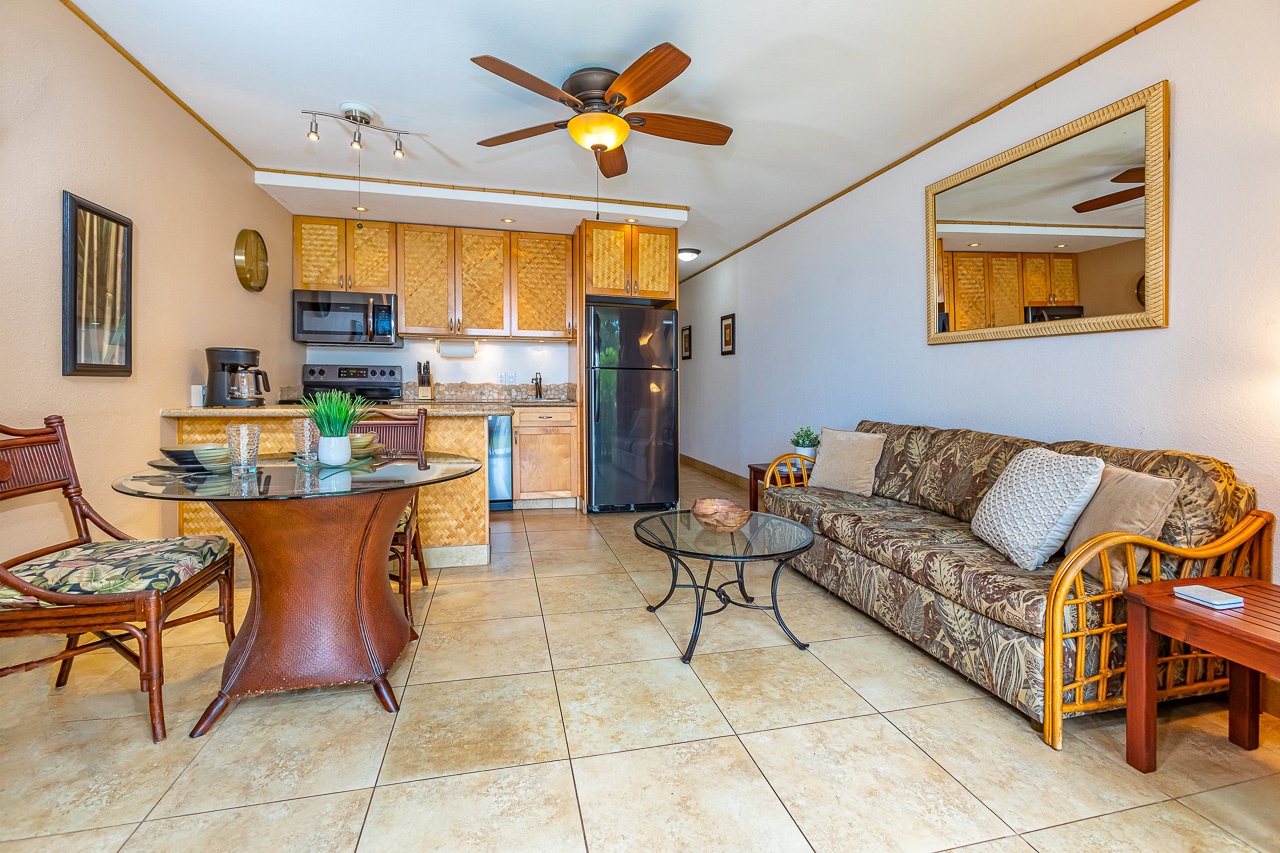 Unwind in your tropical retreat where open-plan living creates a welcoming flow. The full kitchen, cozy seating, and island dining invite you to settle in and enjoy your Hawaiian escape.