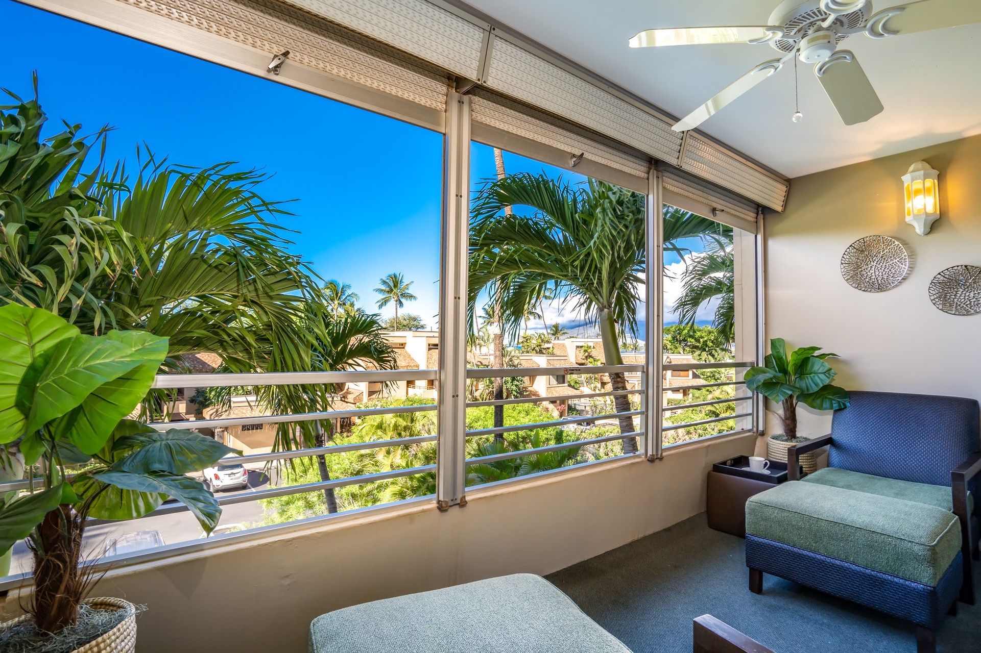 Unwind in your peaceful retreat where tropical breezes drift through open windows and vibrant palms frame views of swaying coconut trees. Your perfect escape awaits.