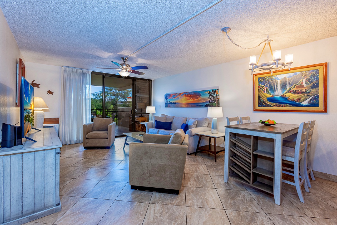 Step into your inviting open-plan living and dining area, where comfortable seating and coastal-inspired decor create the perfect space for relaxation and gathering with loved ones.