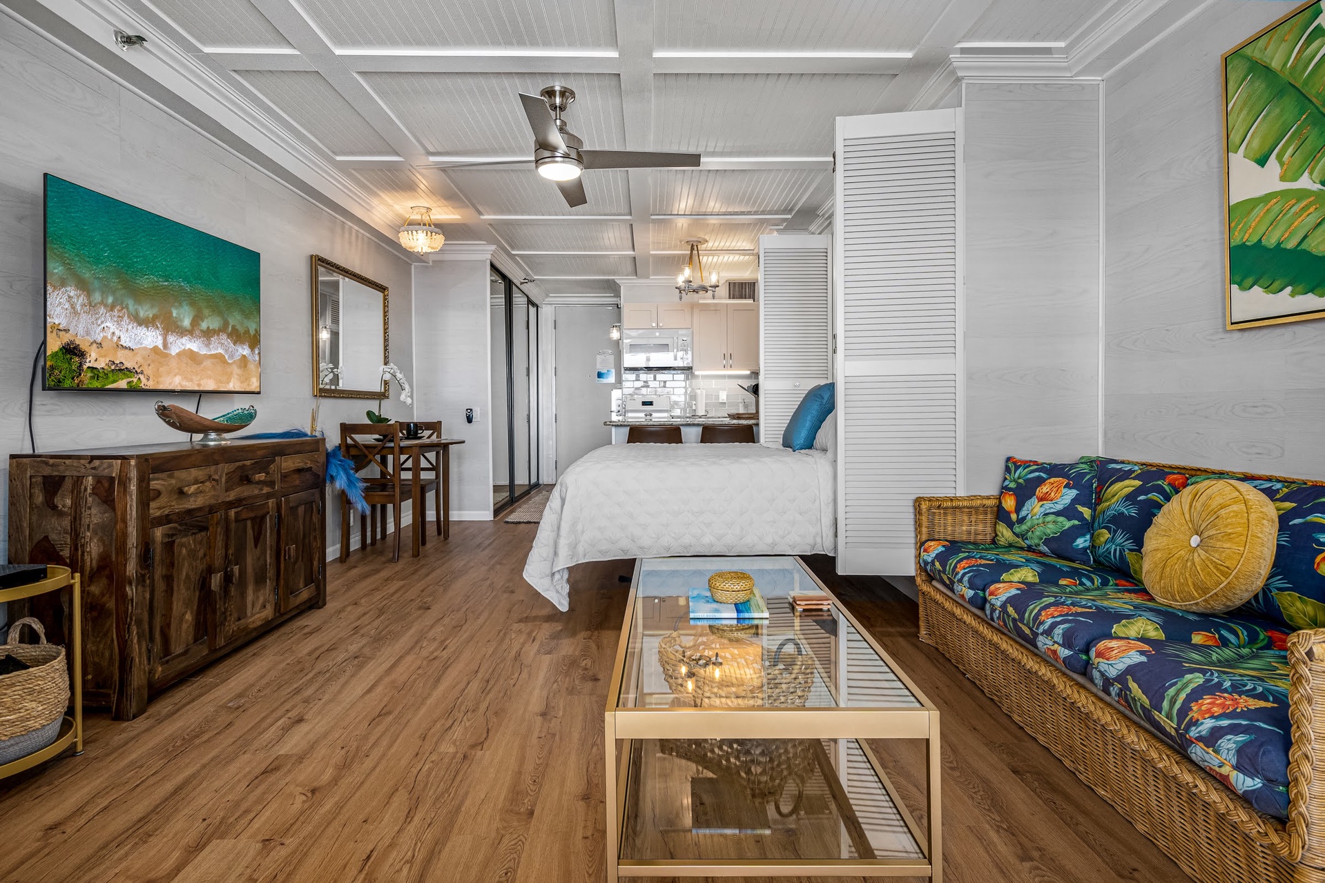 Your bright coastal studio welcomes you with an open layout that seamlessly blends living, sleeping, and kitchen areas.