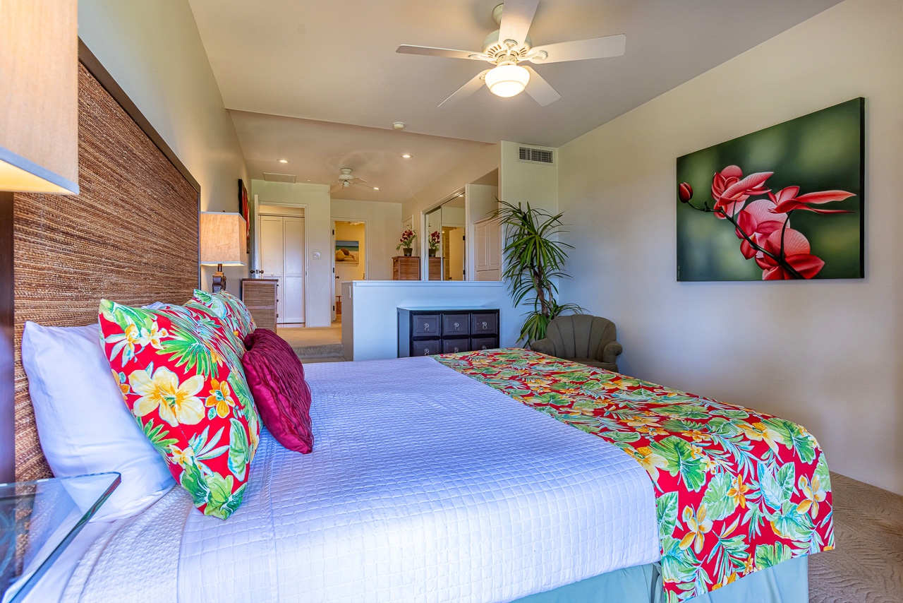 Slip into your island oasis where bright tropical blooms and airy breezes invite pure relaxation. Vibrant linens and warm tones create a cheerful retreat after your day of adventure.