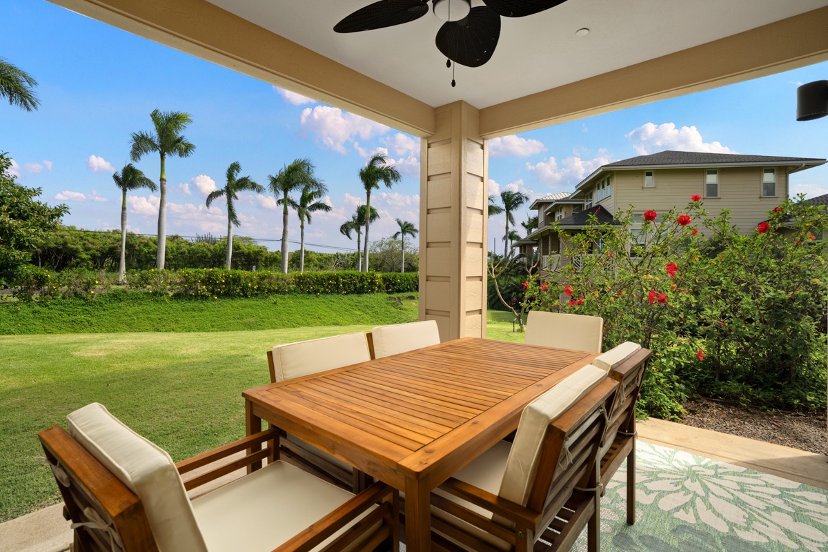 Enjoy tropical dining at your covered lanai overlooking lush lawns and swaying palms in paradise.
