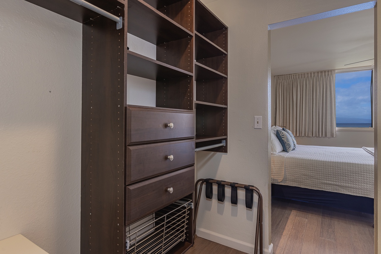 Your custom closet system offers ample storage with built-in drawers and shelving