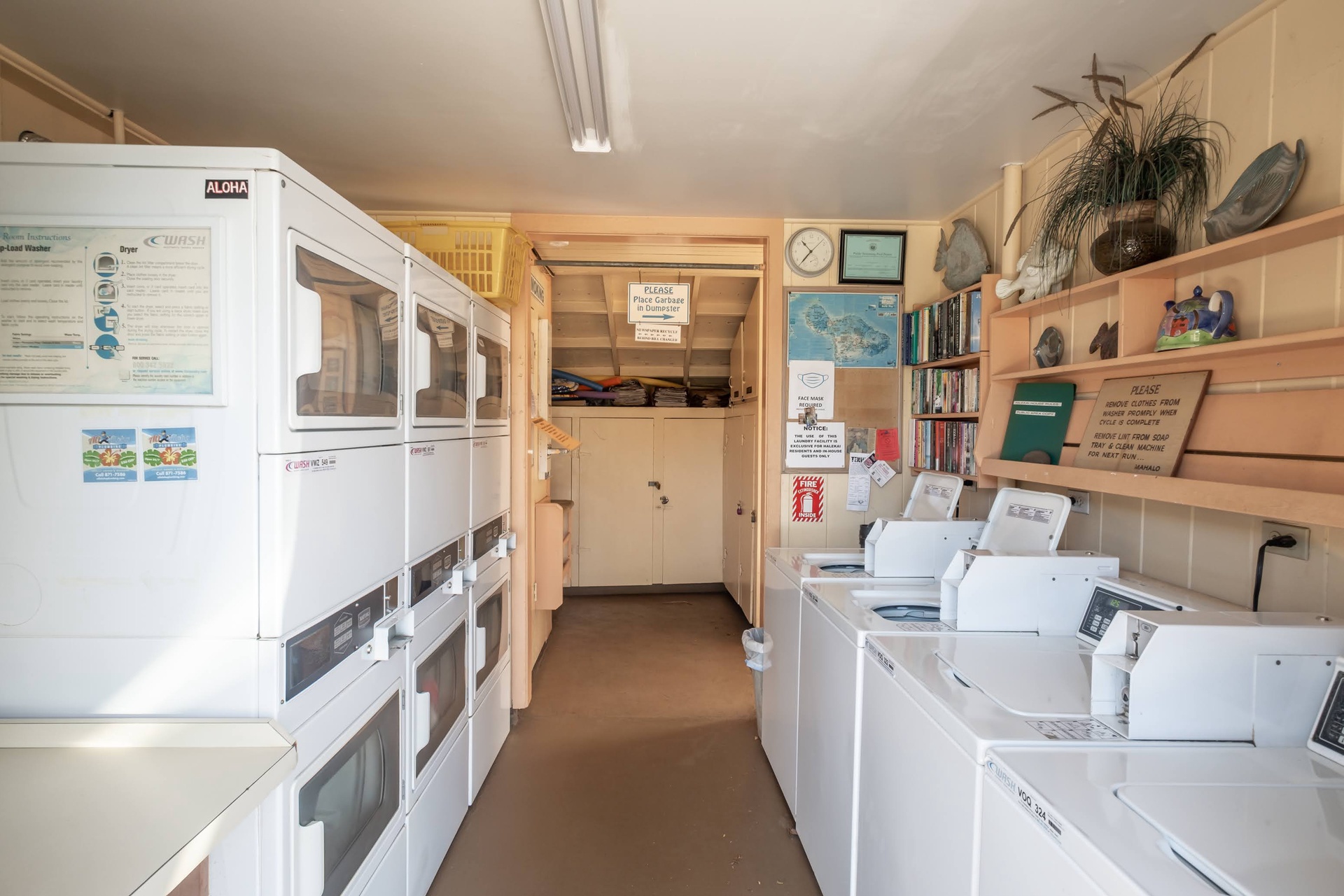 Shared laundry facility features multiple washers and dryers for your convenience.