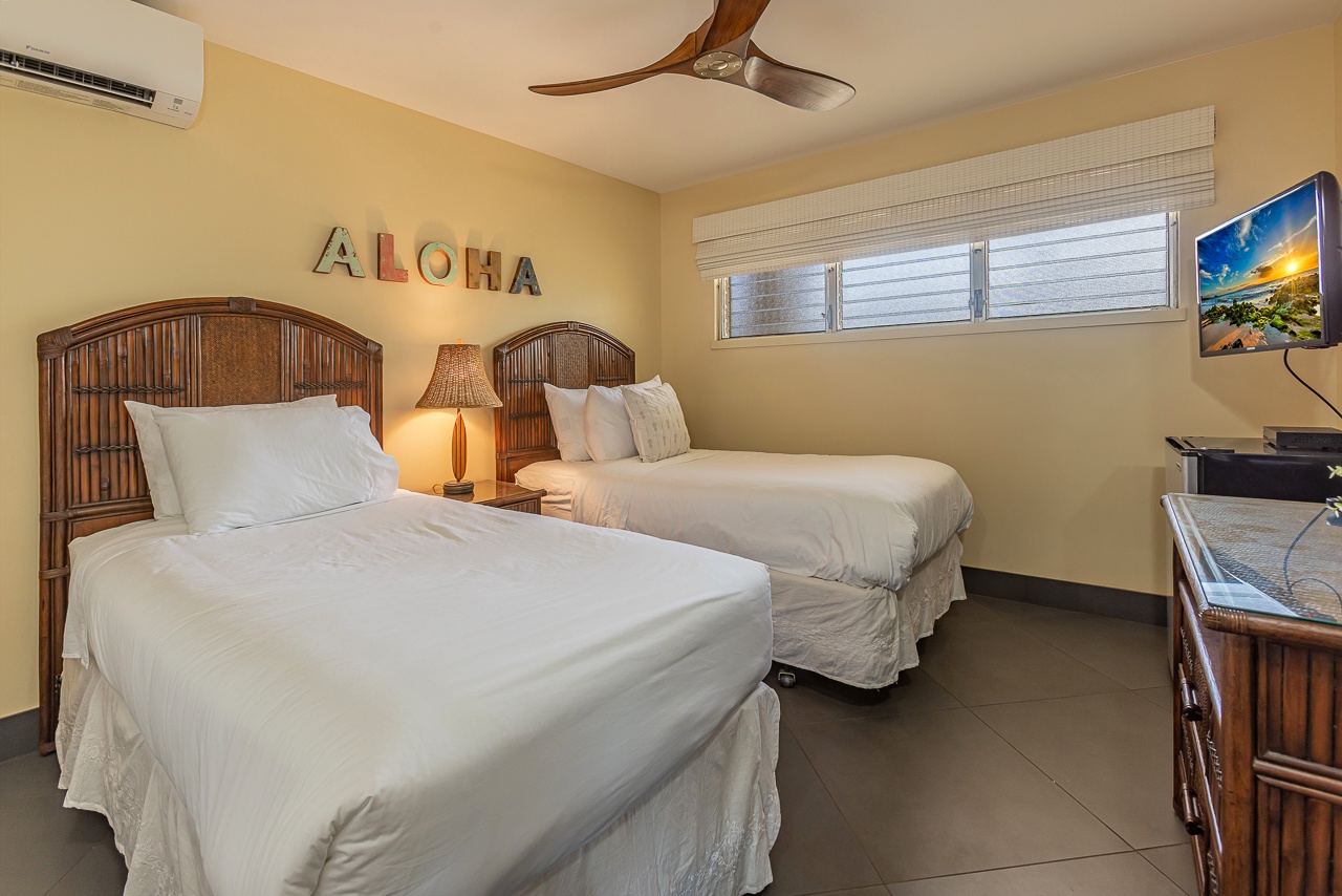 Guest Bedroom with two twin beds that can be converted into a king upon request