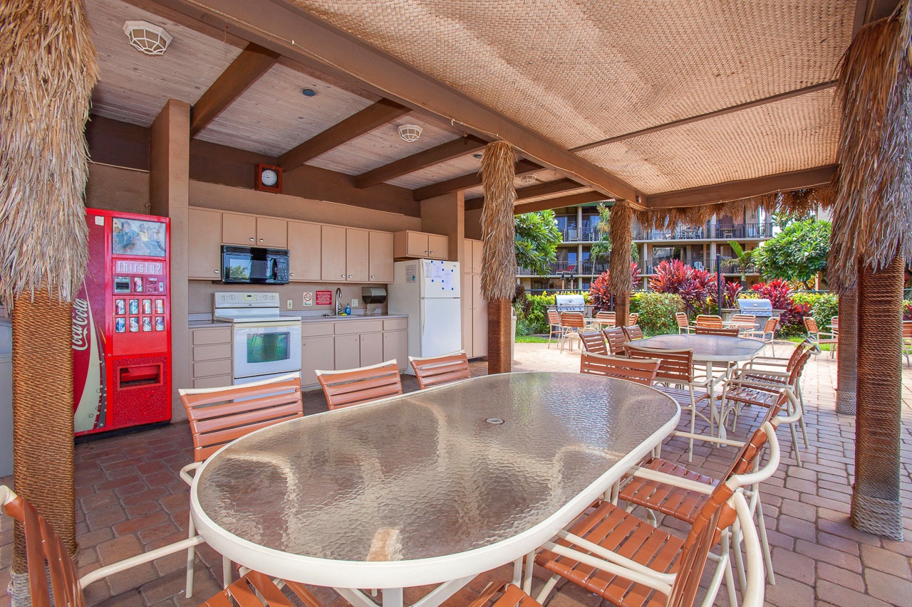 Common area for guest use includes kitchen and soda machine.