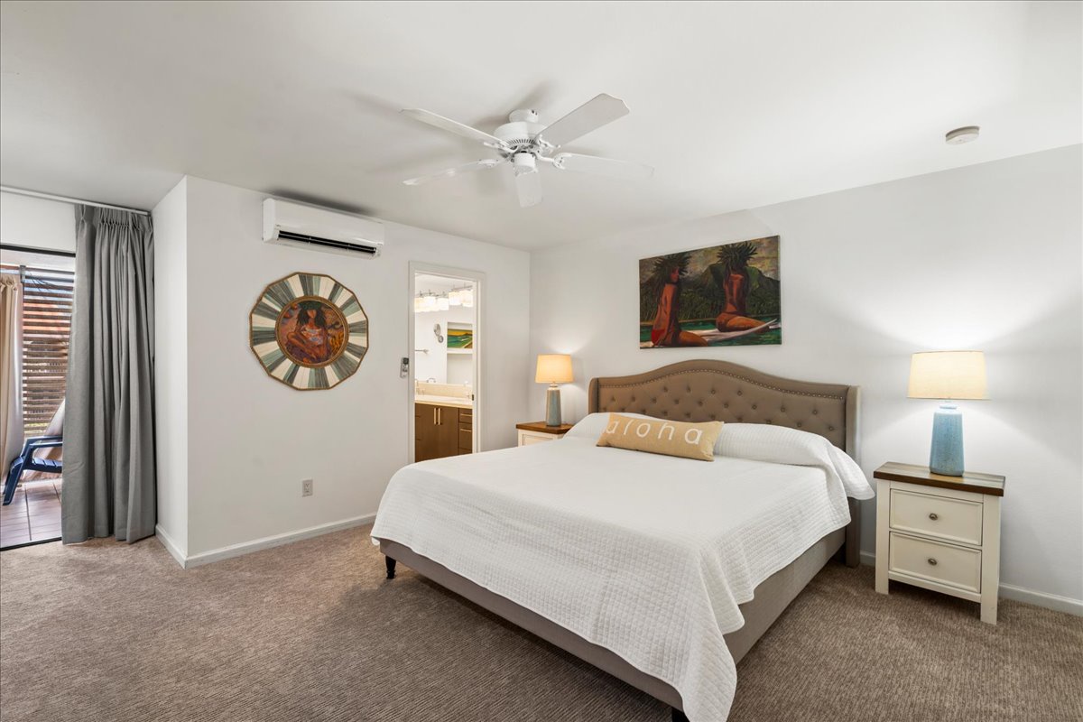 Primary loft bedroom provides ac and smart TV.