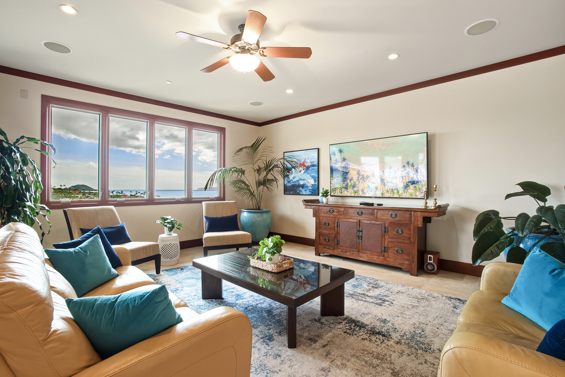 Sunlit living area with sweeping Wailea coastline views