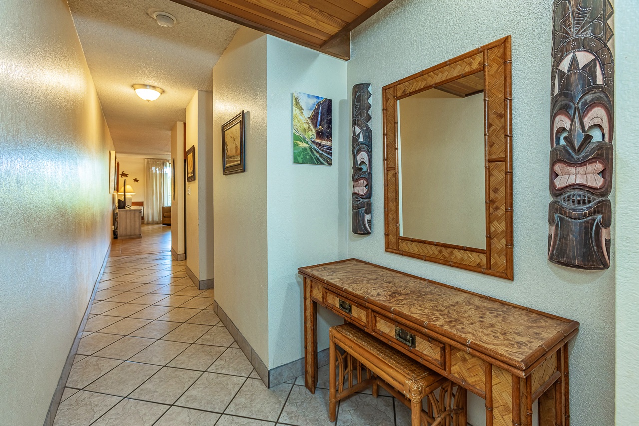 Tropical-inspired touches welcome you into your island retreat, with warm wood accents and island decor creating an inviting entryway to your vacation escape.