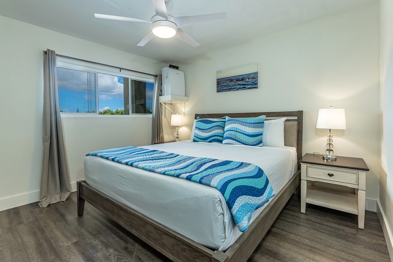 Drift off in a plush king bed after a day by the waves