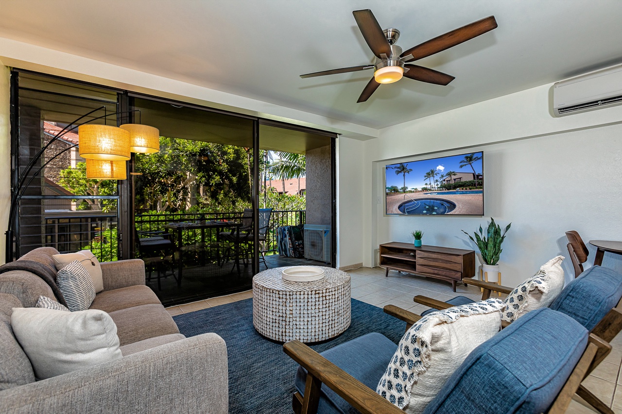 Newly decorated living area with comfort and space in mind.