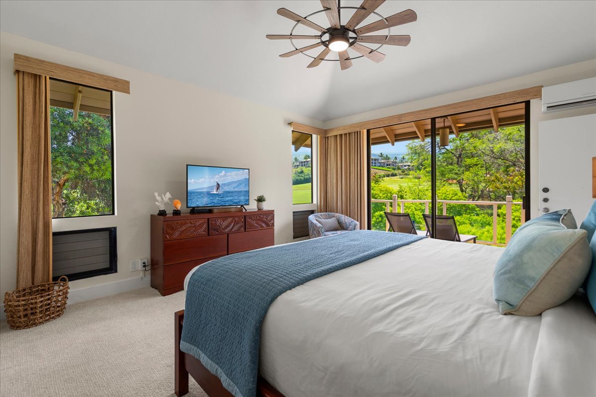 Wake up to lush tropical views from your serene island-style bedroom, where plush bedding and your private lanai create the perfect retreat after days exploring paradise.
