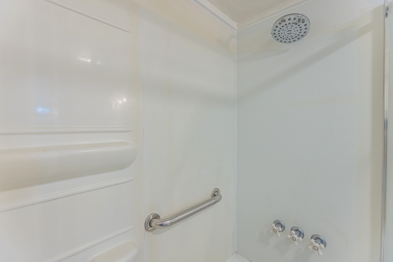 Modern shower with grab bar designed for safety and ease