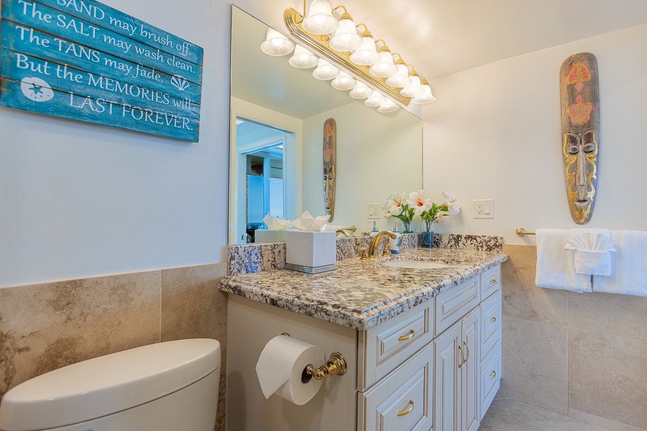 Light-filled en suite with soothing blue and natural accents
