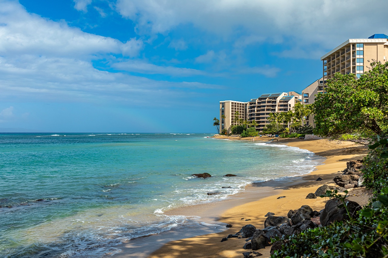 This idyllic beachfront setting surrounds the property, offering tranquil coastal charm and warm tropical sunshine.