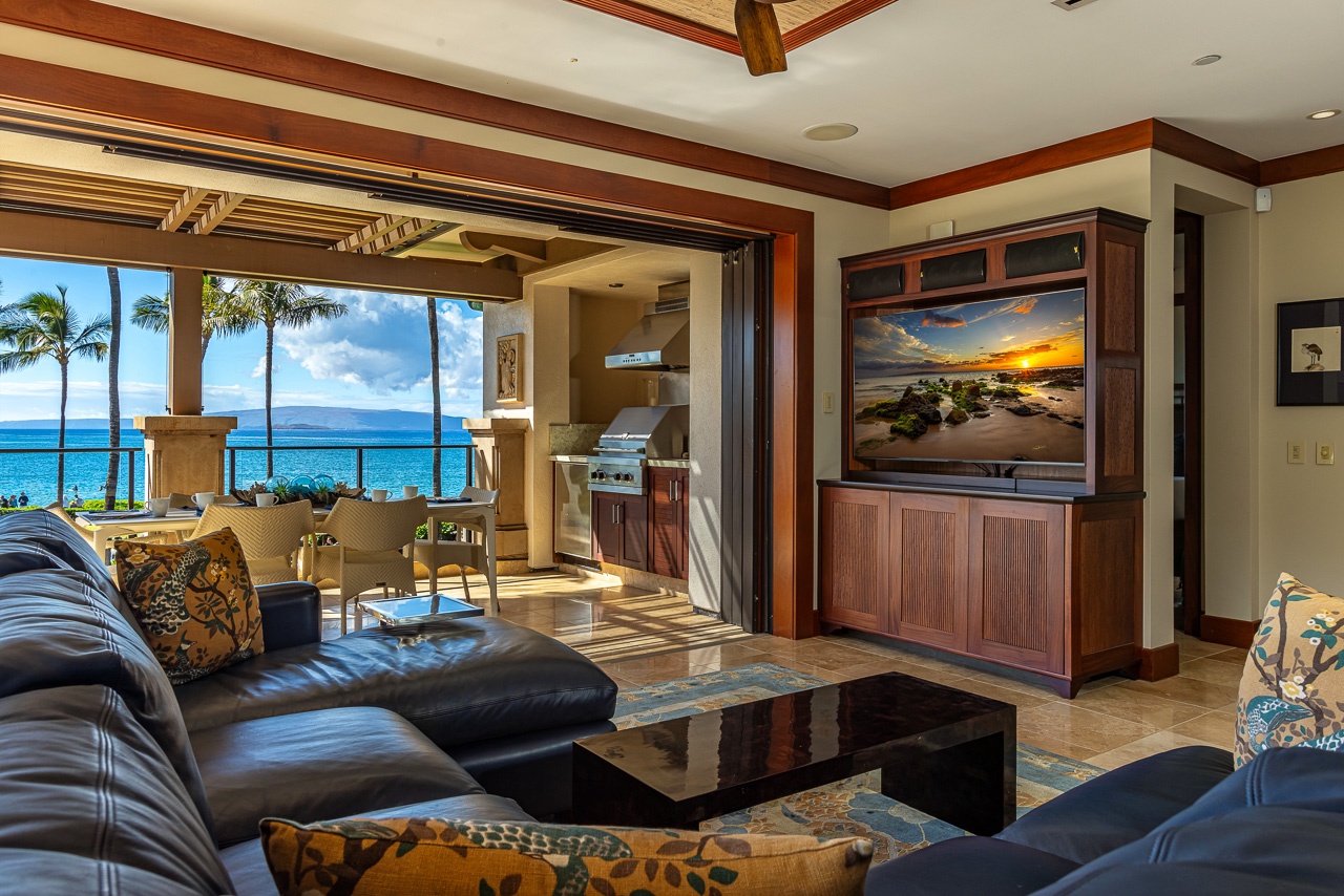 Step into your island sanctuary where ocean breezes flow through open walls and endless blue waters stretch beyond swaying palms. Sink into plush seating and let your worries drift away with each crashing wave.