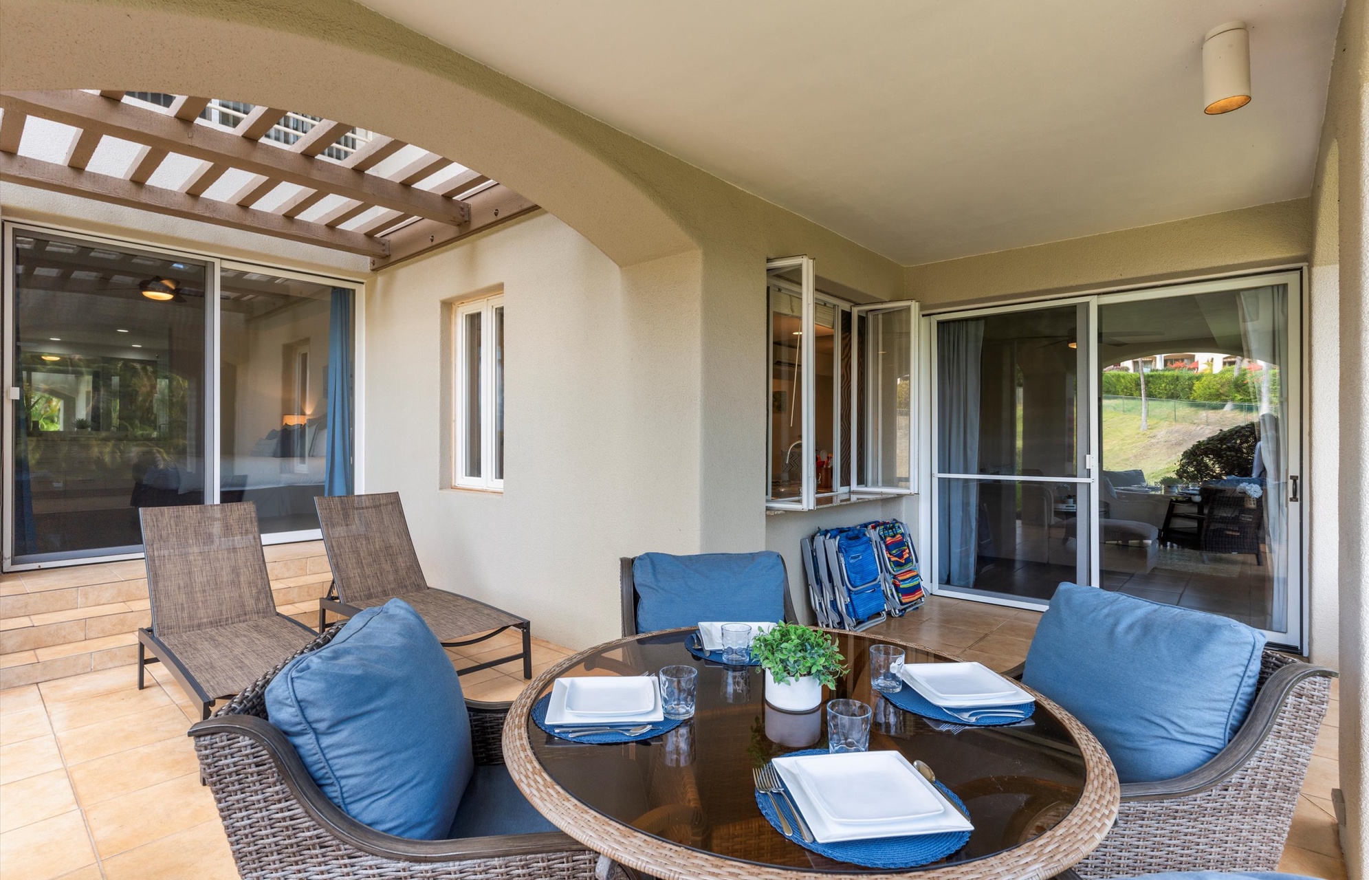 Relax on your private terrace with comfortable seating and direct access to your room—perfect for morning coffee or evening unwinding under the pergola.