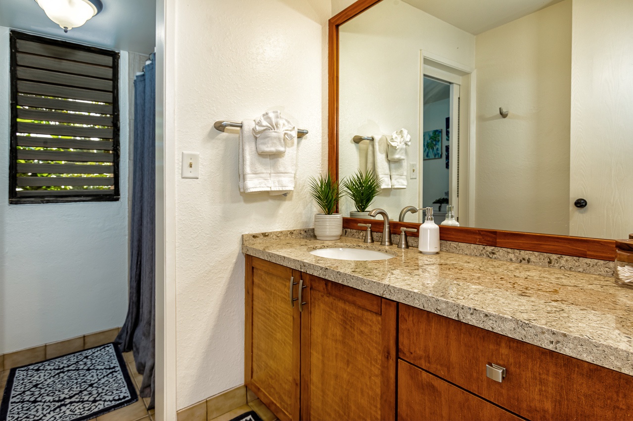 Guest bathroom with vanity county space to help you freshen up.