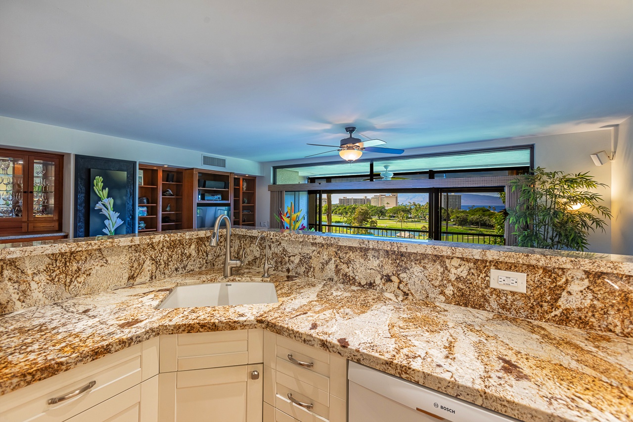 Expansive windows frame peaceful evening views while you prepare meals.
