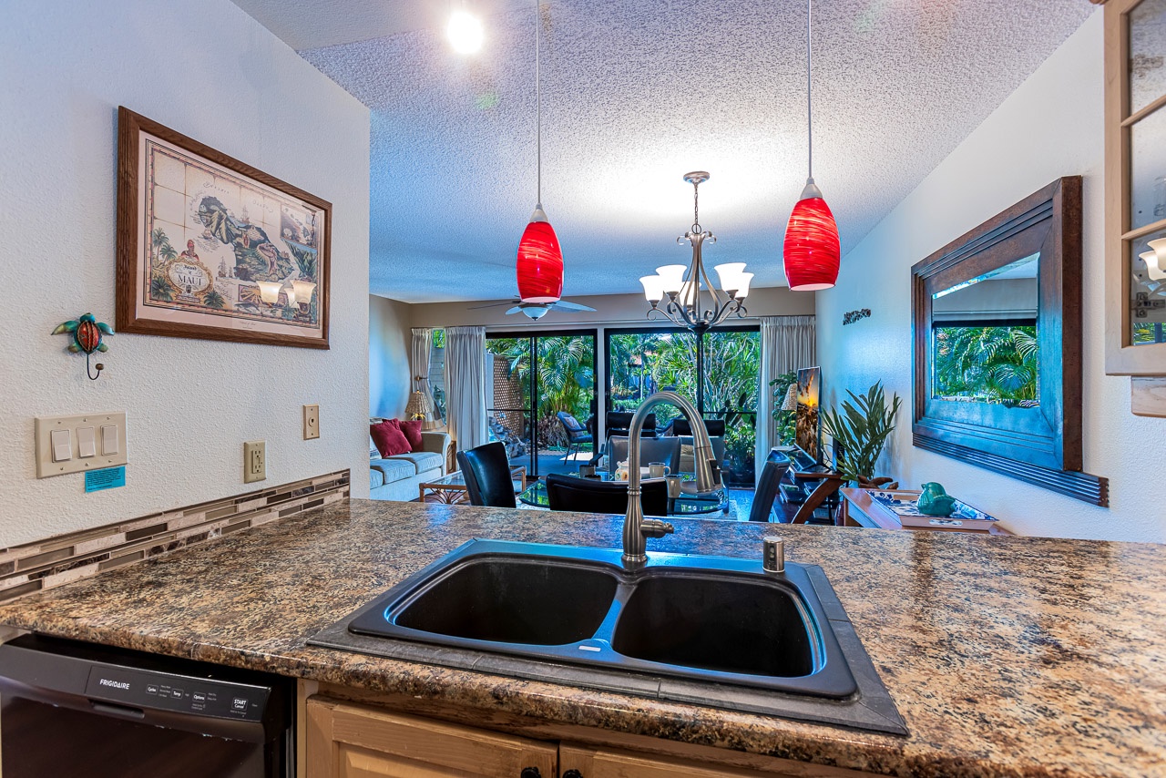 You'll love cooking in this kitchen overlooking your tropical living space.