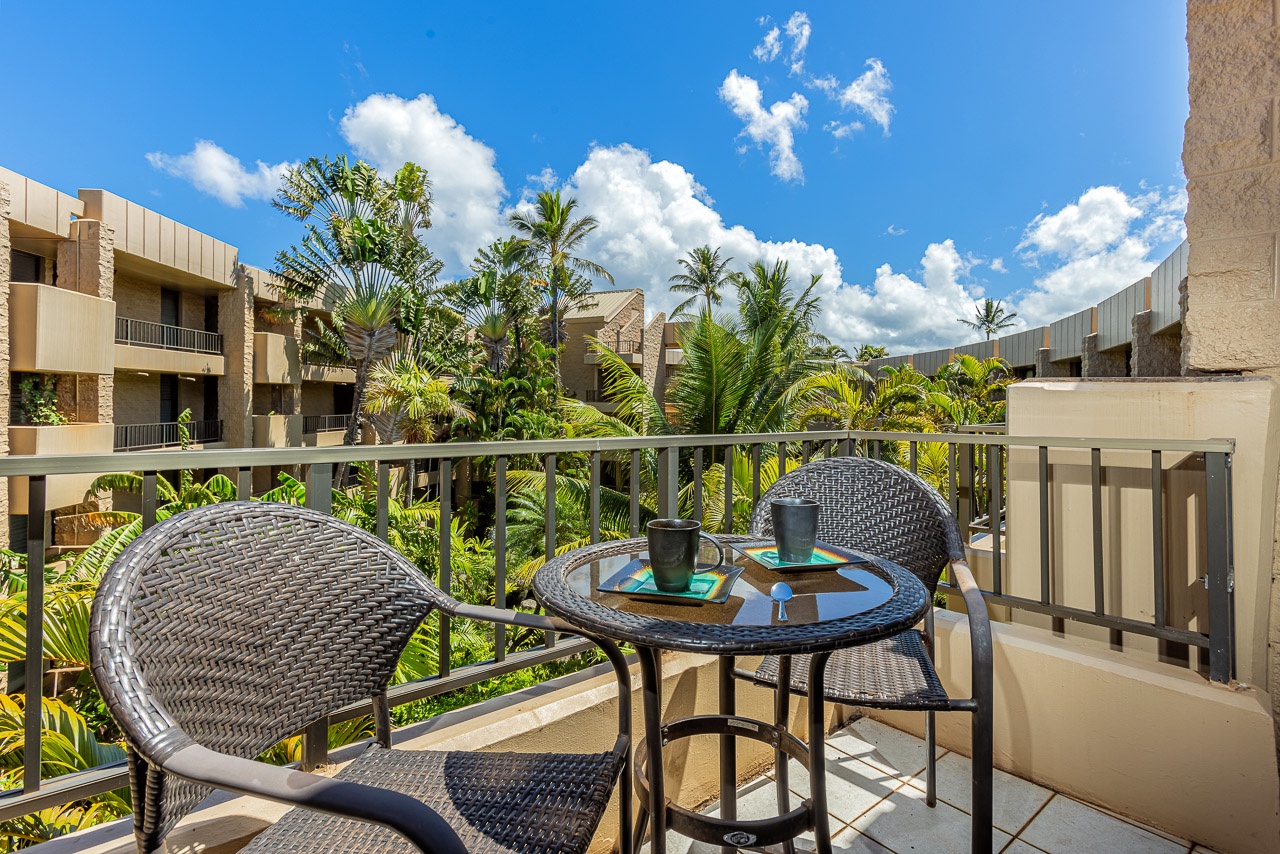 Step onto your private balcony where tropical palms sway under bright blue skies. Sip your morning coffee at your bistro table and soak in the lush garden views surrounding your peaceful retreat.