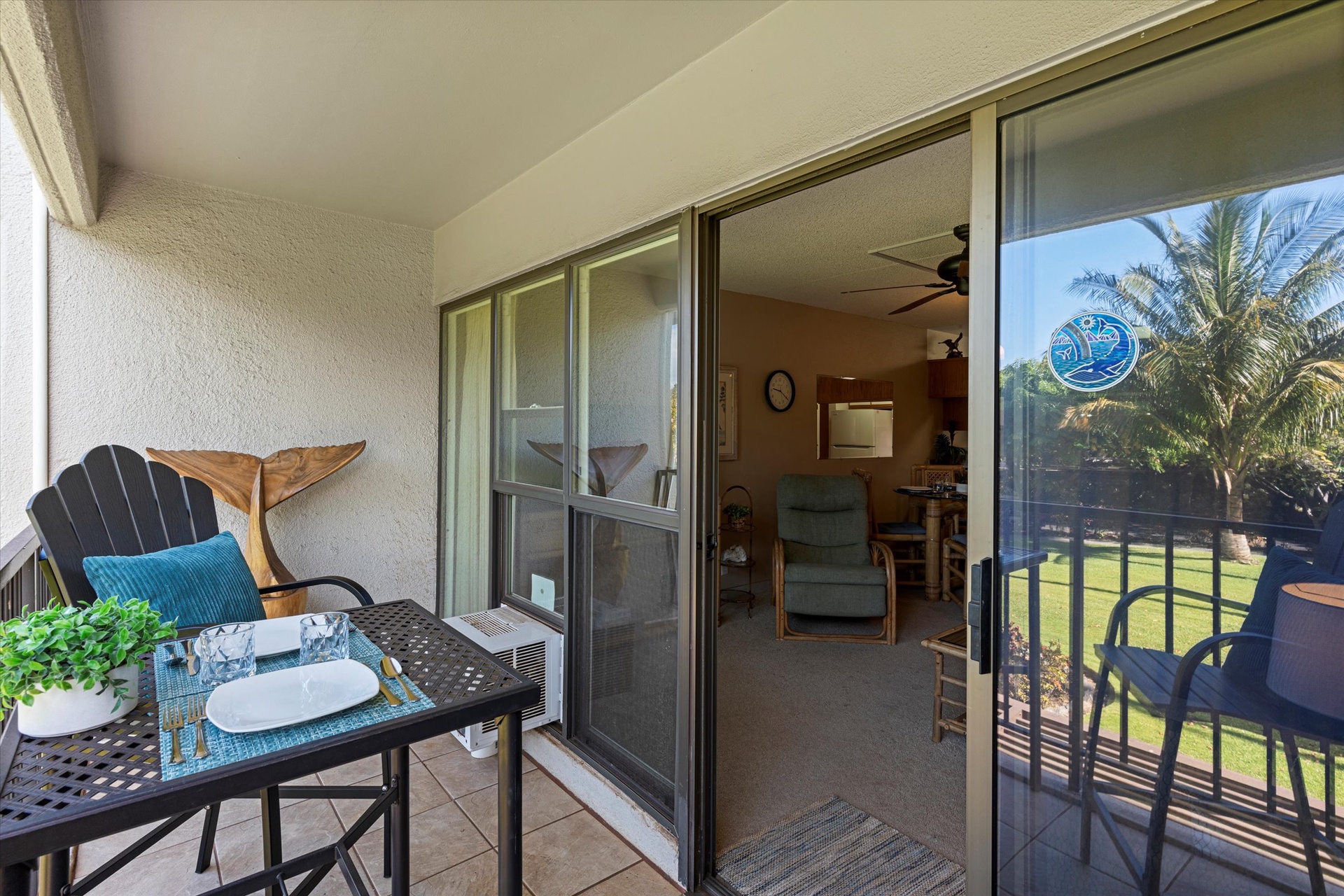 Step onto your private balcony, where morning coffee feels even better with tropical breezes and swaying palms just beyond the railing.