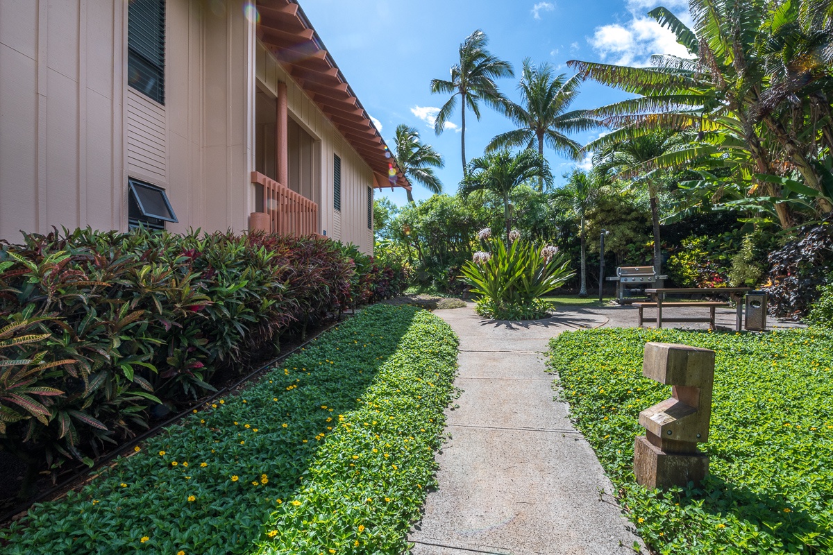 Wander beautifully kept grounds in the heart of Poipu Kai