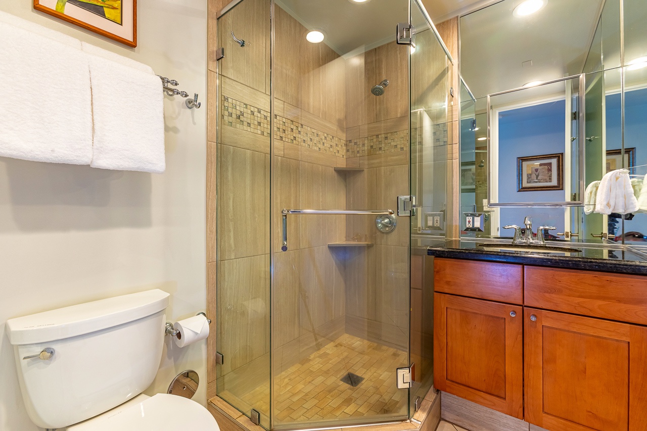Spacious bathroom designed with convenience and comfort in mind.