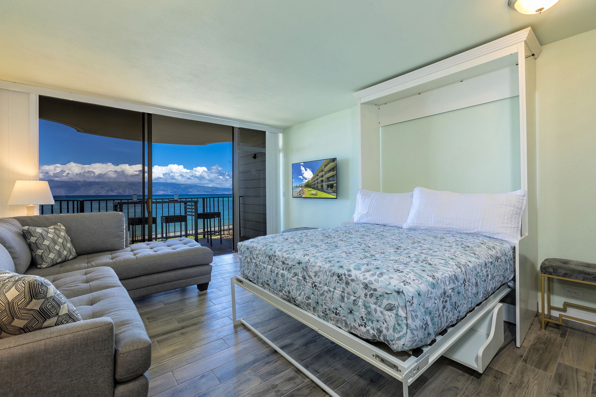 Relax on the plush sofa or unwind in your Murphy bed, all while soaking in breathtaking balcony views of turquoise waters and endless skies.
