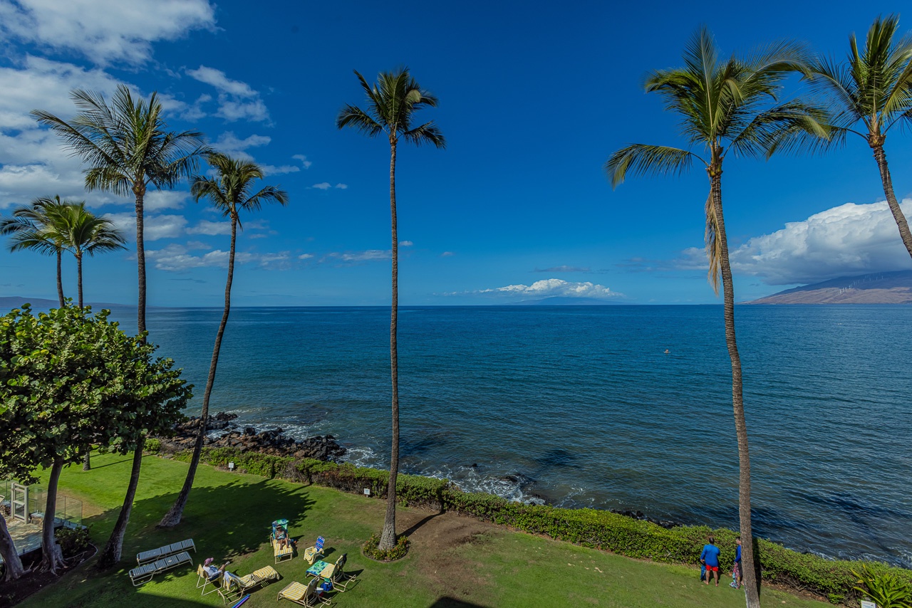 Watch paddle boarders, snorkelers, and turtles dawn to dusk