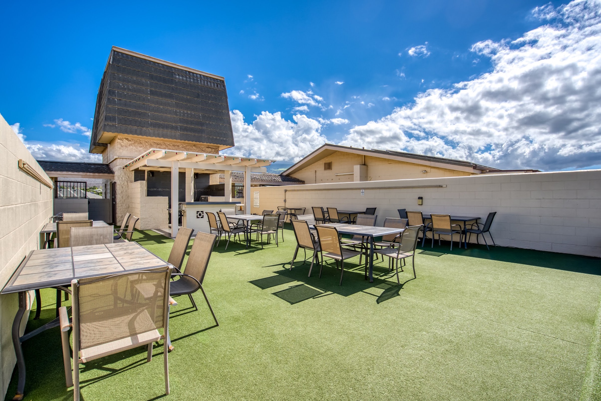 Gather with friends and family in this spacious outdoor dining area, where your meals are accompanied by clear blue skies and fresh air.