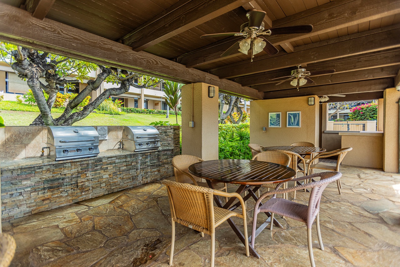Enjoy open-air meals under wood-beamed ceilings, with tropical gardens surrounding your covered dining area and built-in grills ready for cookouts.