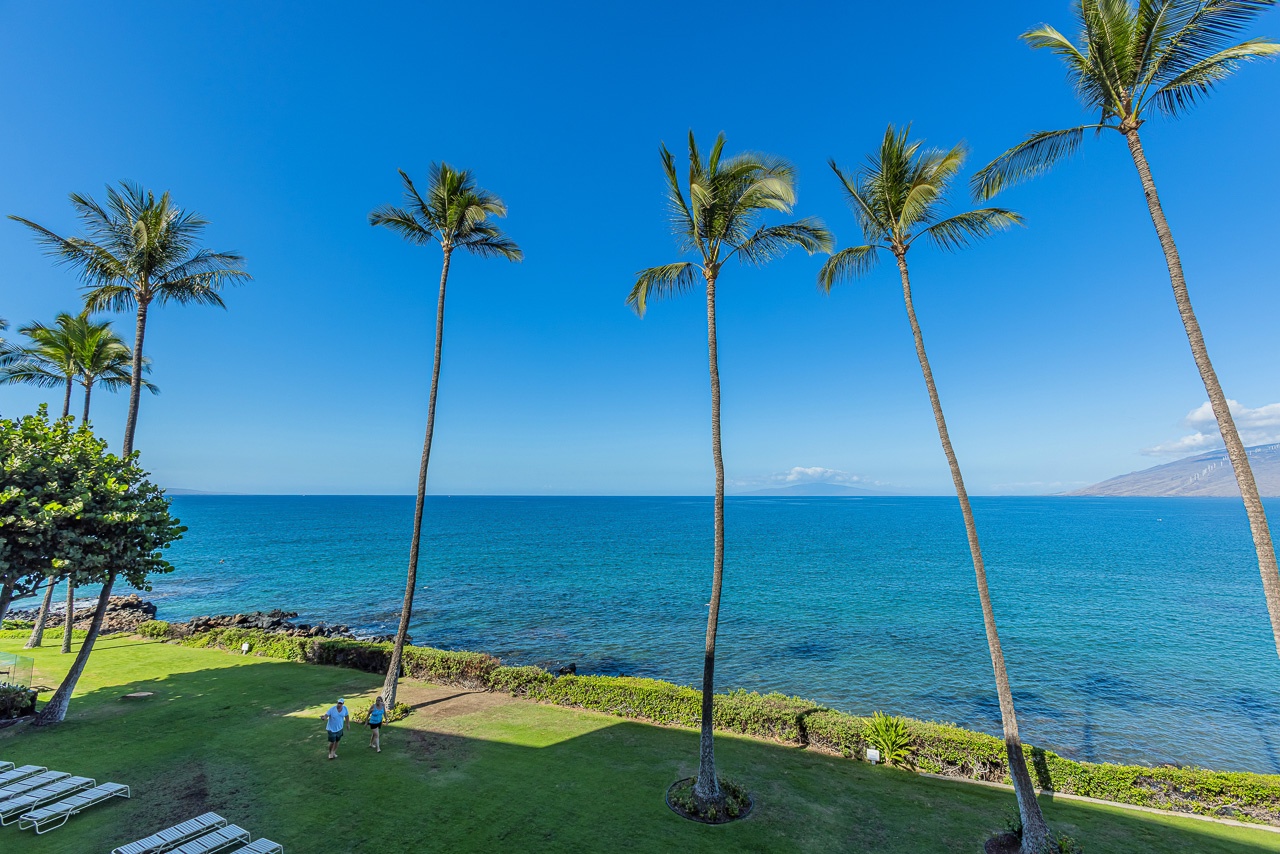 Watch paddle boarders and turtles from your private lanai
