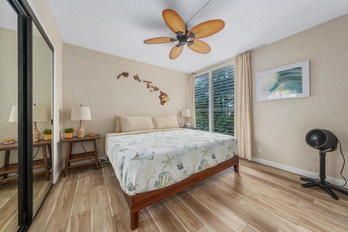 Drift into comfort in this inviting island bedroom