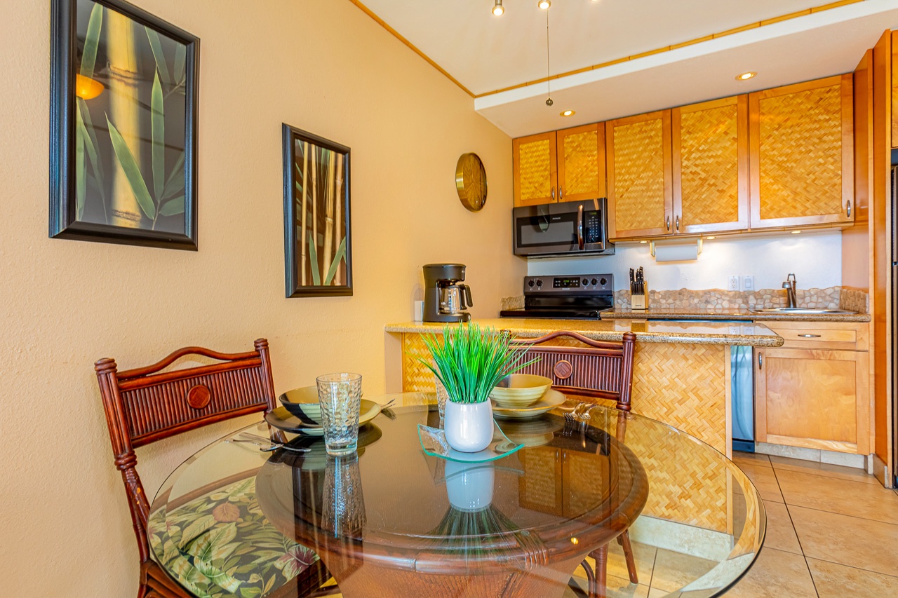 Your tropical-themed kitchen and dining space, complete with woven bamboo cabinetry, fresh island-style décor, and everything you need to cook up a delicious meal or sip morning coffee.